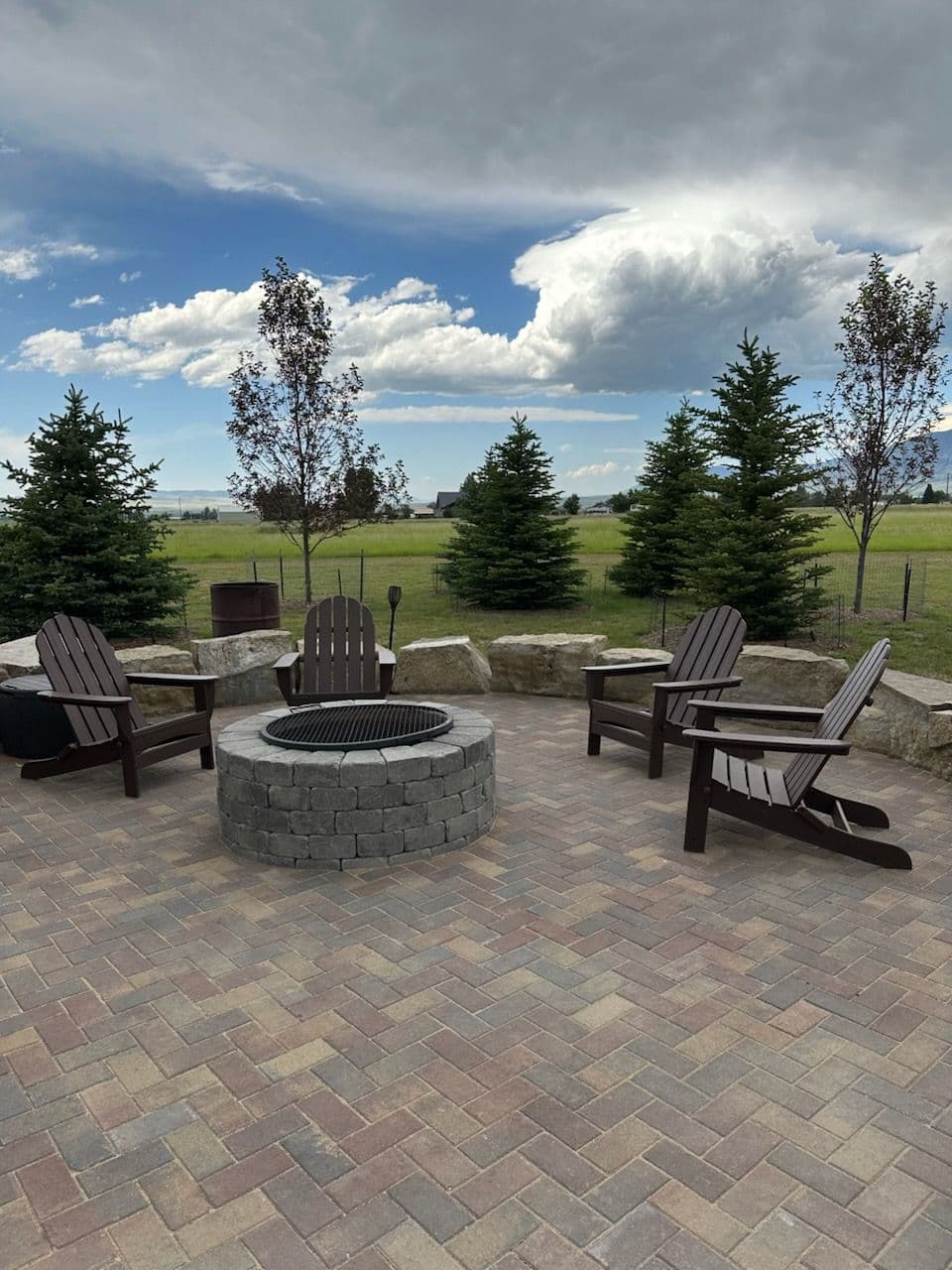 Charming Paver Patio with Classic Fire Pit image